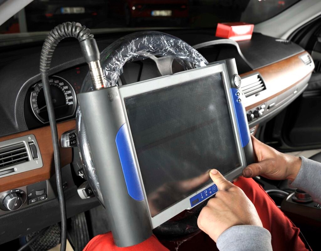 repairing car with computer